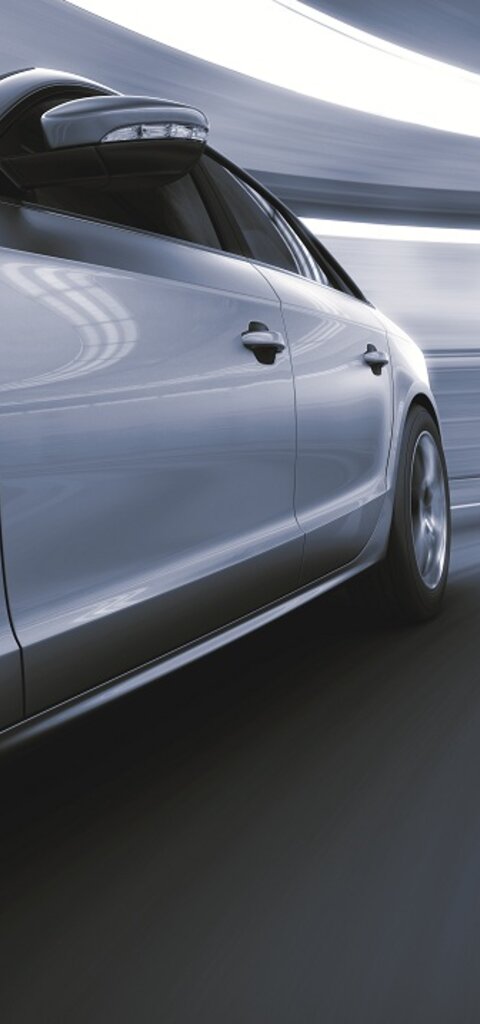 PVD Coatings  of  high-speed vehicle in a tunnel – representing friction-loaded engine parts like piston pins, valve discs, and injection systems exposed to thermal and corrosive stress in the transport industry