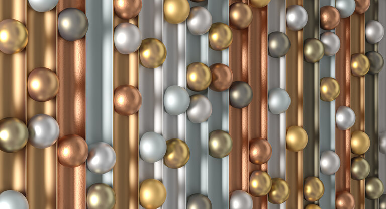PVD Coating – Decorative and Functional Layer Systems Symbolic image of a PVD coating with multilayer metallic surfaces in gold, copper, and silver – for wear protection and design applications at RÜBIG