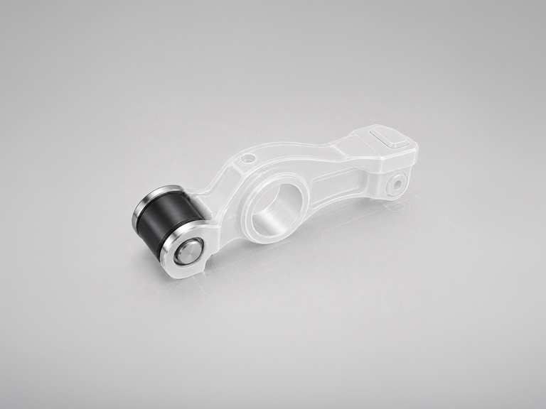 Coated rocker arm with low-friction surface for reduced wear